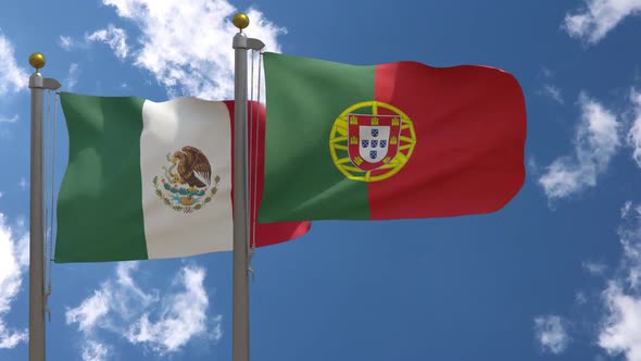 Mexico Flag Vs Portugal Flag On Flagpole