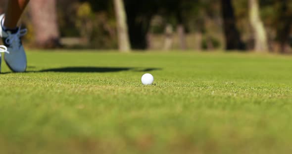 Golfer playing golf