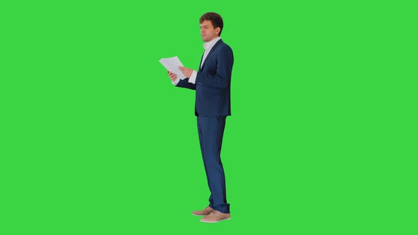 Concentrated Businessman Reading Documents Report Green Screen Chroma Key