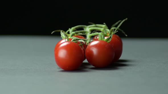 Branch of Natural Cherries Tomatoes Gyrating