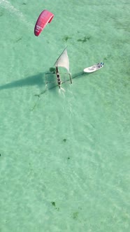 Boat Boats in the Ocean Near the Coast of Zanzibar Tanzania Slow Motion Vertical Video