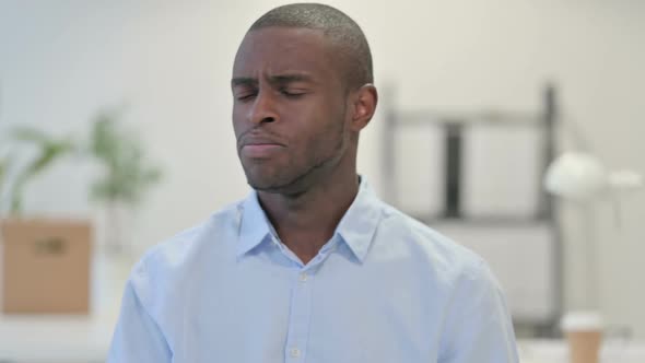 Portrait of No Sign By African Man By Head Shake in Office