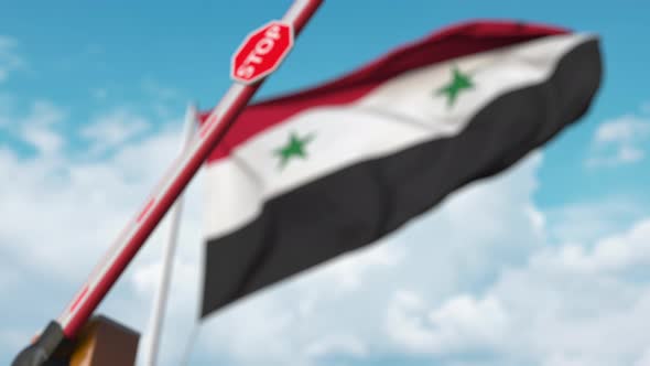 Closed Boom Gate on the Syrian Flag Background