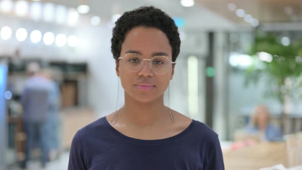 Portrait of Casual African Woman Shaking Head in Denial, No Sign 