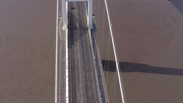 Cars and Vehicles Crossing the Severn Bridge in the UK Aerial View