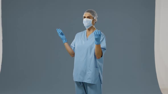 Young surgeon in scrubs