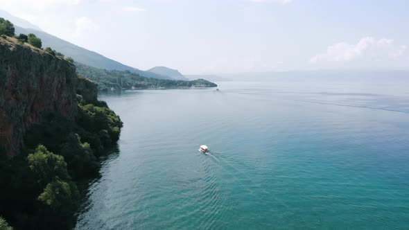 Aerial shot of Macedonia coast. Clif and beautiful water around Ohrid Lake in Southern Europe. Rever