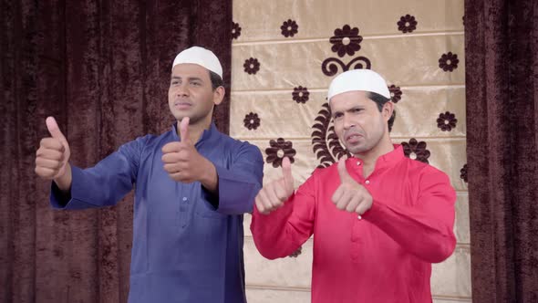 Muslim men showing Thumbs up