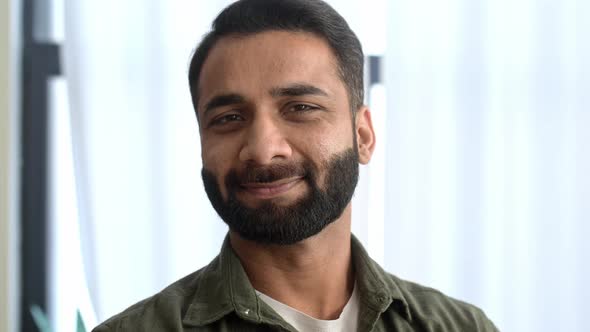 Closeup Portrait of a Successful Positive Bearded Indian or Arabian Businessman Manager or IT