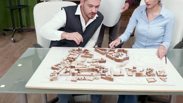 Team of Architect Thinking How To Modernise City Centre