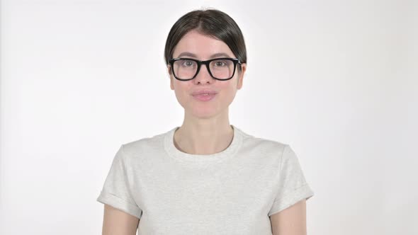 Cheerful Woman Smiling at Camera on White Background