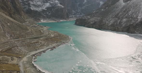 Zooming in aerial shot of stunning view of Attabad Lake, in Gojal Valley, Hunza, Gilgit Baltistan, P