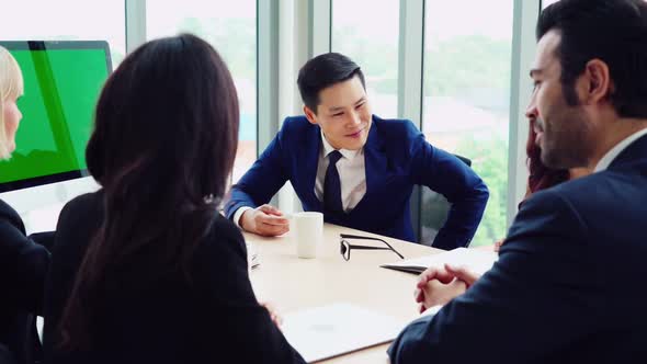 Business People Wearing Headset Working in Office