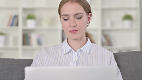 Portrait of Hardworking Young Woman Working on Laptop