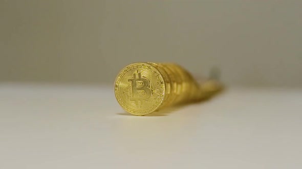 Slow Motion Fallen Golden Coins of Bitcoin Payment System