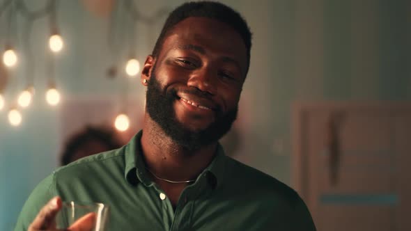 Happy African American Man Dancing During Party