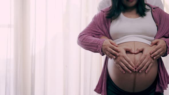 Pregnant Couple Feels Love and Relax at Home