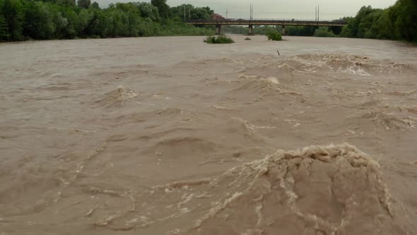 Aerial Drone View. Depiction of Flooding Mudslide, Big Waves. Suitable for Showing the Devastation