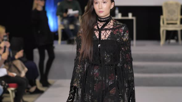 Chinese Asian Fashion Model on Catwalk Podium