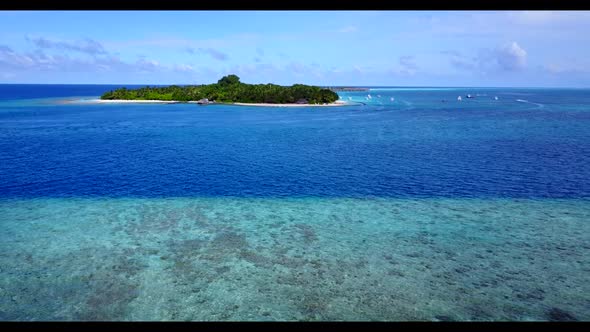 Aerial flying over tourism of perfect island beach trip by turquoise lagoon with white sand backgrou