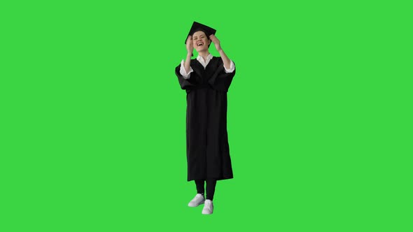 Graduation Student Woman Applauding Smiling on a Green Screen, Chroma Key.