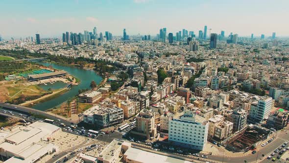 Aerial of Tel Aviv city skyline, Hayarkon river, Israel.