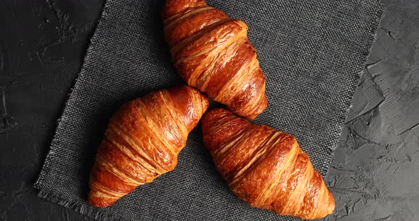 Golden Baked Croissants on Napkin