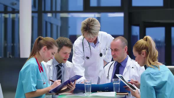 Team of doctors having a meeting in conference room