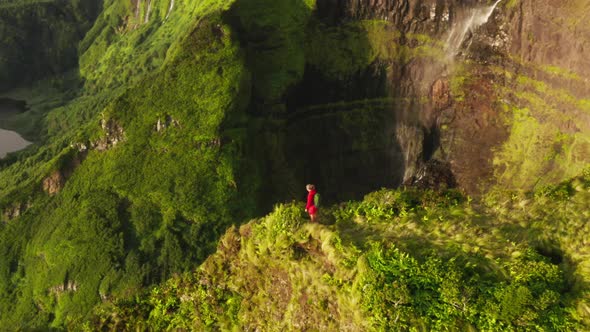 Aerial Footage of a Tourist Exploring Remote Mountainous Island