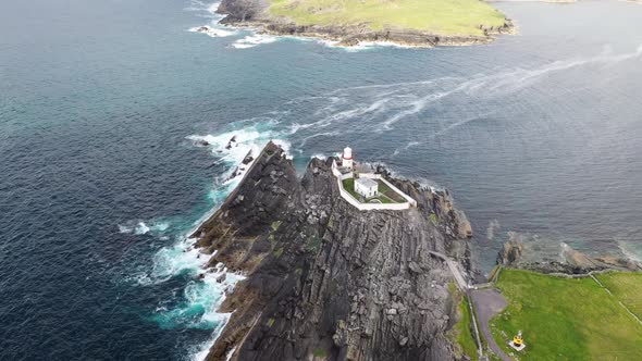 Beautiful View of Valentia Island Lighthouse at Cromwell Point. Locations Worth Visiting on the Wild