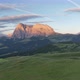 Dolomites mountains peaks with a hiking path on a summer sunrise - VideoHive Item for Sale