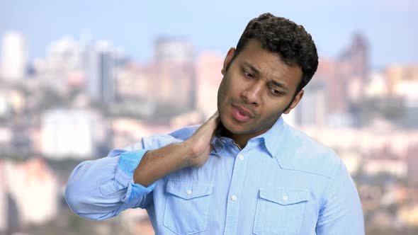 Close Up Unhappy Man Suffering From Neck Pain