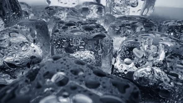 Wet Melted Ice Cubes with Waterdrops, Ice Super Macro, Slider Shot