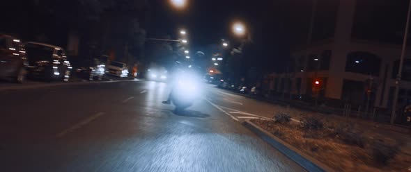 Motorbike driving at Night in the City