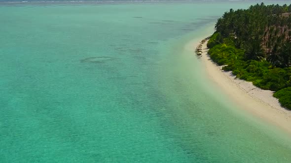 Aerial view texture of bay beach by blue lagoon with sand background