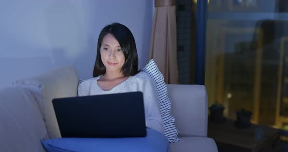 Woman work on computer at home