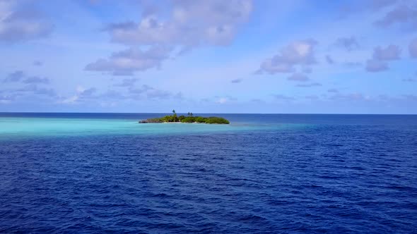 Aerial drone landscape of lagoon beach break by blue water with sand background