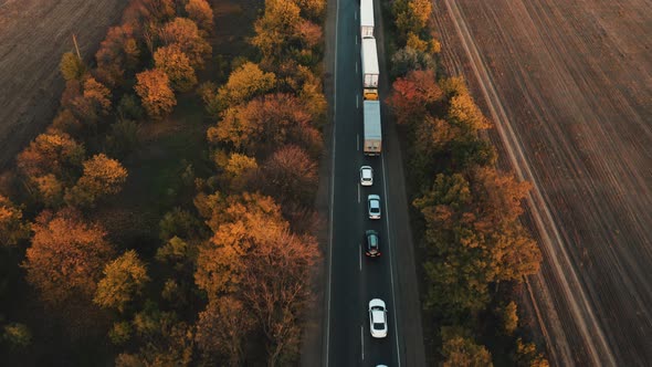 Aerial View of a Traffic Jam From Cars and Trucks on an Evening Suburban Road