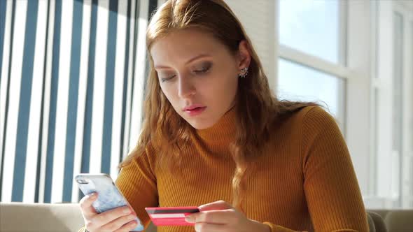 Beautiful Sunny Day Young Woman Drinks Morning Coffee in a Cafe, Making Online a Purchase Easy