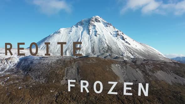 Flying Through the Letter Frozen in Irish and English Towards Errigal Mountain in Ireland
