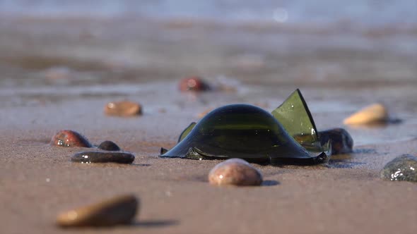 Broken Glass On The Beach