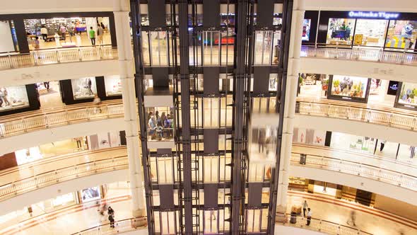 Multi-storey Shopping Center with Transparent Elevators Malaysia Timelapse