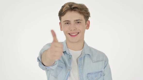 Young Man Showing Thumbs Up Sign on White Background