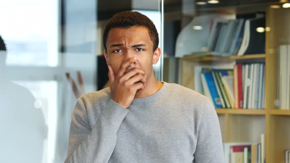 Shocked Afro-American Man, Portrait at Work, Amazed by Surprise