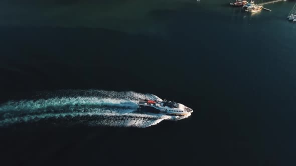 Aerial View on Large Ship Sailing Towards the Marina on Lipari Island, Sicily, Italy. Mediterranean