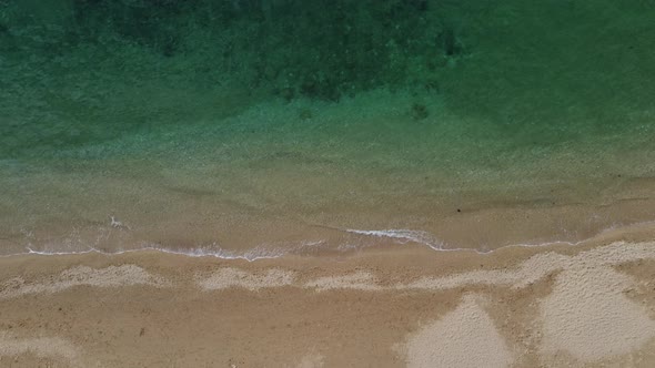 Beautiful Remote Beach with Crystal Clear Water Aerial View