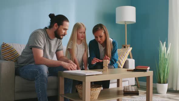 Friendly Family Plays Board Game