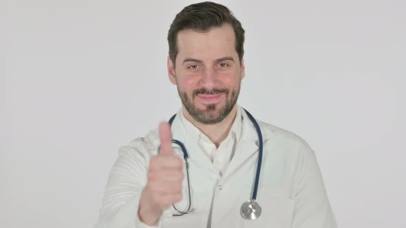 Portrait of Doctor Showing Thumbs Up Sign  White Screen