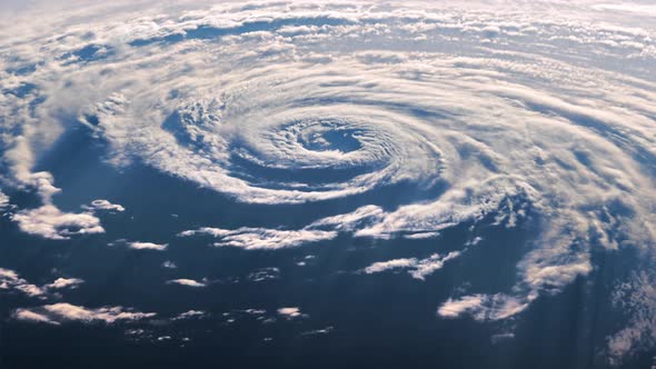 A View From Space Of A Large Hurricane In The Light Of A Moving Sun