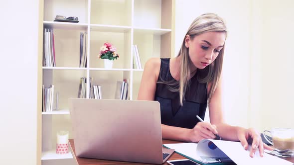 Blonde Business Woman Working at Modern Office